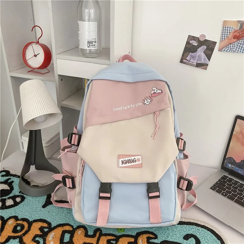 DCIMOR New Waterproof Nylon Women Backpack Female Contrast Color Cartoon Printing Buttoned Travel Bag Teenage Girl Schoolbag