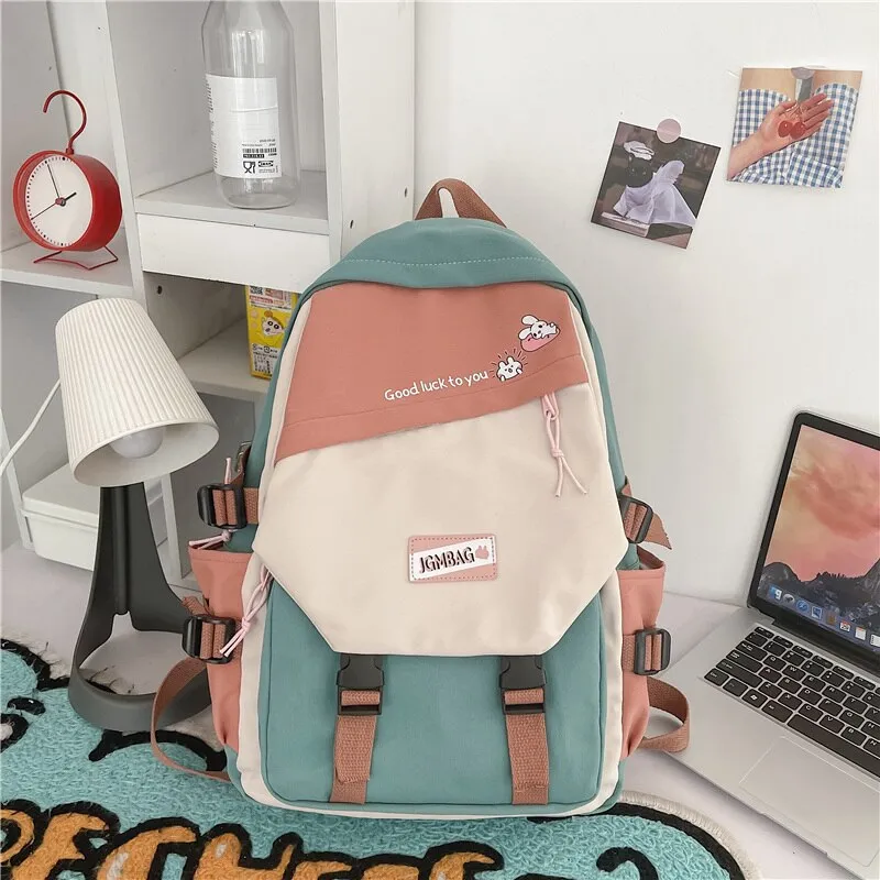DCIMOR New Waterproof Nylon Women Backpack Female Contrast Color Cartoon Printing Buttoned Travel Bag Teenage Girl Schoolbag